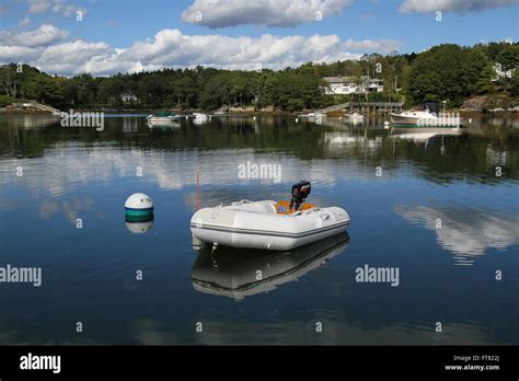 Inflatable dinghy outboard motor hi-res stock photography and images ...