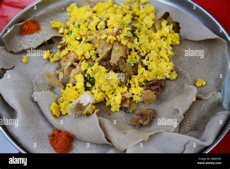 Firfir with scramble eggs is a popular breakfast in Ethiopia Stock ...