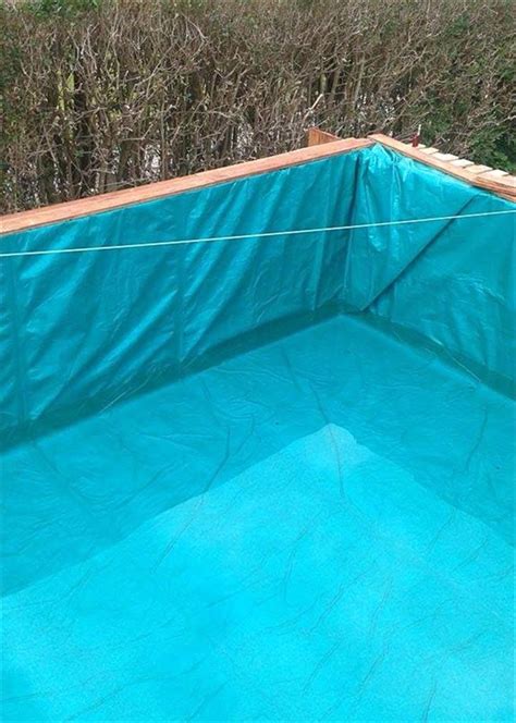 custom wooden outdoor swimming pool made of 40 pallets | Building a swimming pool, Diy swimming ...