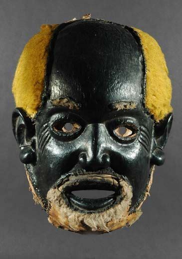 A rare mask of the Nyau. Chadzunda "The Old Deaf Man" or "The Chief". The face of the old man is ...