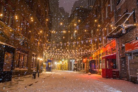 Snow on Stone Street Manhattan New York in the Winter Financial ...