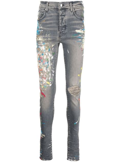 AMIRI paint-splatter skinny jeans | Smart Closet