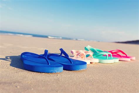 Colorful Sandals at the Beach Stock Photo - Image of tropical, sand ...