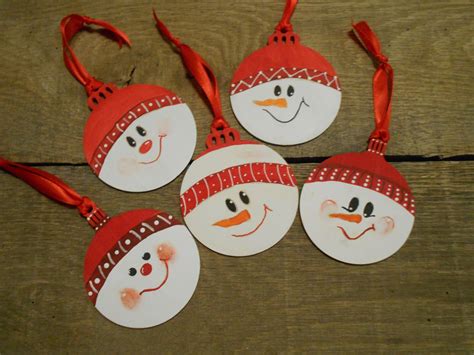 Hand painted wooden snowman face ornaments Choice | Etsy | Holiday crafts decorations, Snowman ...