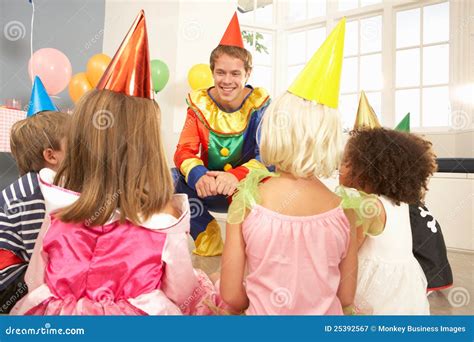 Clown Entertaining Children at Party Stock Image - Image of indoors ...