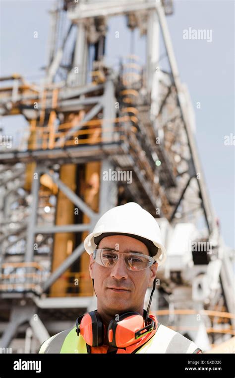 Engineer working on oil rig Stock Photo - Alamy