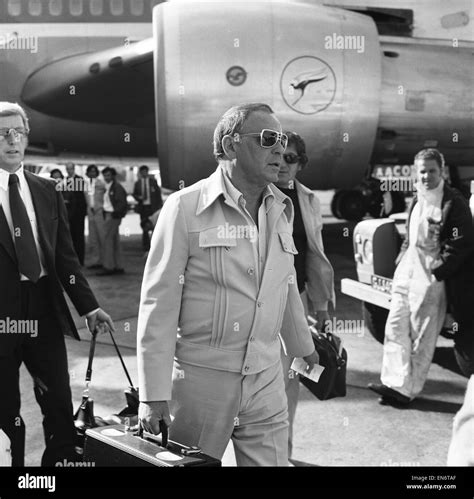 Singer Frank Sinatra seen here arriving from Australia at London ...