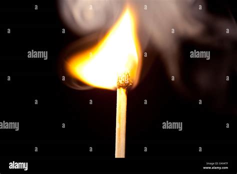 Match set on fire Stock Photo - Alamy