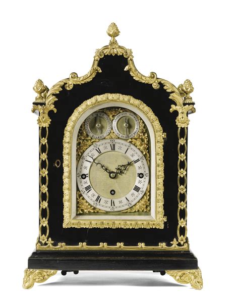 (#126) A gilt-mounted ebonised chiming mantel clock