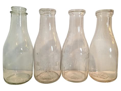 Vintage Milk Bottles - Set of 4 | Chairish