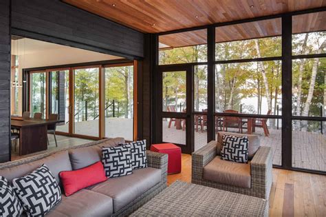 A warm yet inviting modern lake cottage in Canada used for entertaining