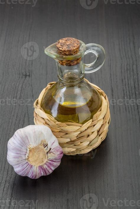 Garlic with oil 11553622 Stock Photo at Vecteezy