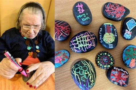 Valley View Care home residents paint rocks for Hengoed children