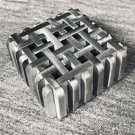 A mechanical puzzle made up of 12 identical shaped pieces