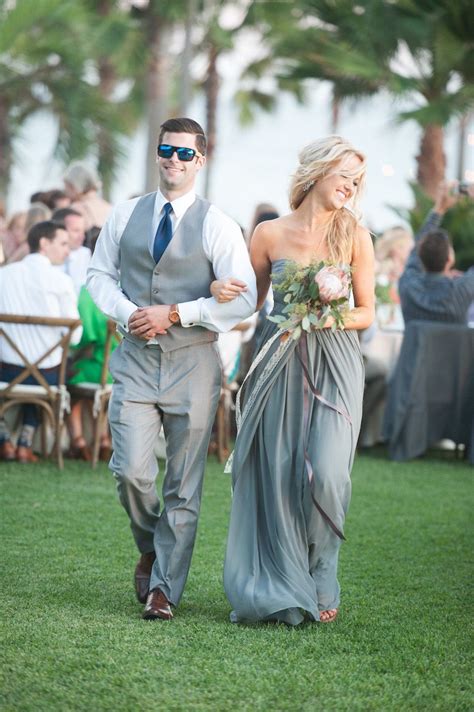 Bridesmaid donned a long, grey strapless dress. Photography: EDLT Photo ...