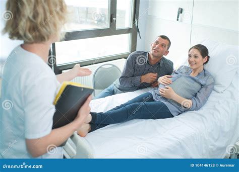 Pregnant Woman and Man in Delivery Room Stock Photo - Image of mother, child: 104146128