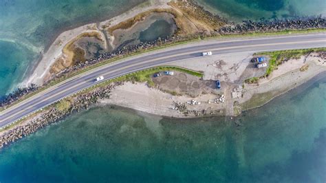 Aerial photo of roads on small island with cars driving 5097920 Stock ...