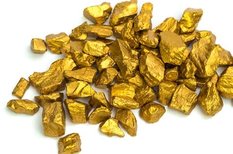 Premium Photo | A pile of gold nuggets or gold ore on white background