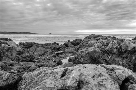 Premium Photo | View of valdearenas beach in cantabria spain at sunset ...