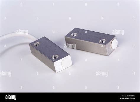 magnetic reed switch sensor and magnet Stock Photo - Alamy