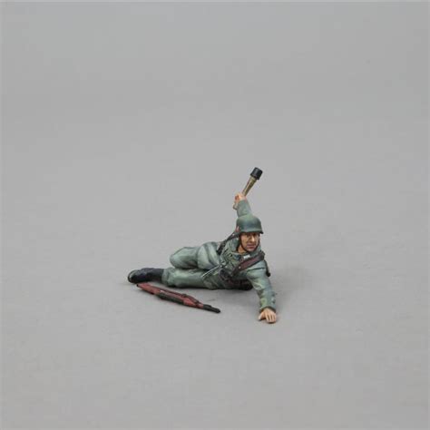 WWII German Heer Private Lying Down, Throwing ‘Potato Masher’ grenade ...