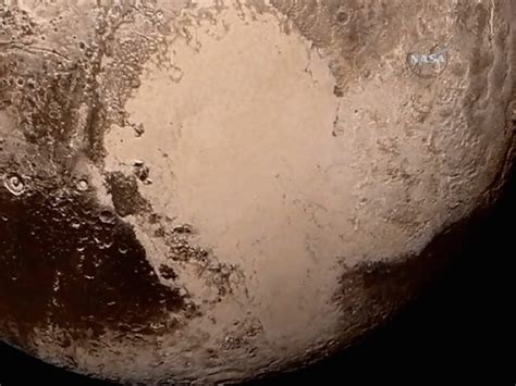 The sharpest photos of Pluto were just released and point to why th...