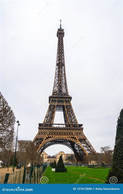 View at Eiffel Tower from the Champ De Mars Field of Mars Stock Photo - Image of background ...