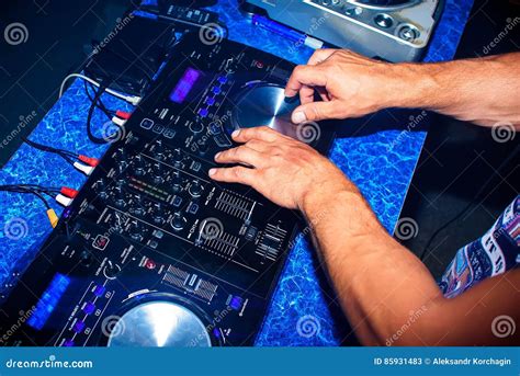 DJ Mixes Professional Music Equipment for Disco in Night Club Stock ...