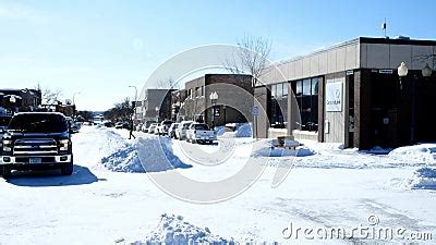 Bemidji, MN - 8 FEB 2019: Village Street Scene After A Winter Snow Storm. Stock Footage - Video ...