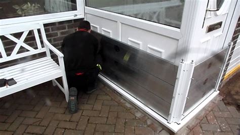 Image Flood Defence Installing a Bespoke flood barrier - YouTube