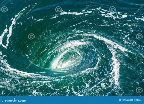 A Powerful Whirlpool at the Surface of the Sea Stock Image - Image of ...