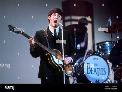 BEATLES Paul McCartney in 1964 with his Rickenbaker bass guitar Stock ...