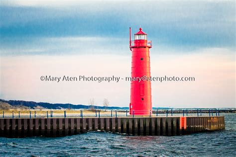 Photo of red lighthouse in Muskegon Michigan - Mary Aten Photography