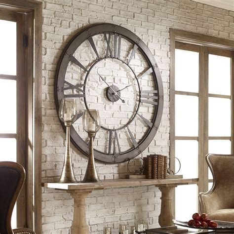 The Uttermost Ronan Wall Clock is the perfect industrial statement piece for any room. Rustic ...