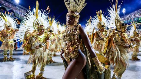 Watch: Rio Carnival performers parade through streets