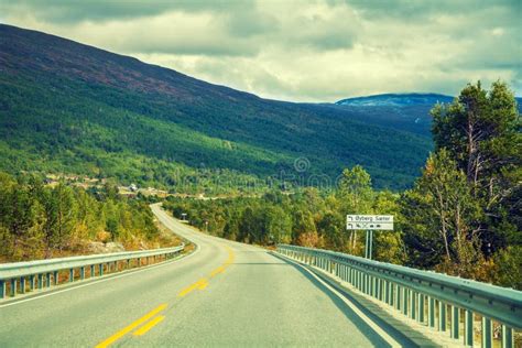 Mountain Road at Sunset with Cloudy Sky. Stock Photo - Image of autumn, dramatic: 114683344