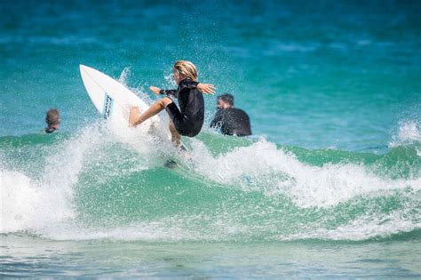 Surfing Trigg Beach, WA