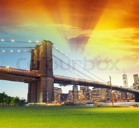 Brooklyn Bridge as seen from the park at night | Stock image | Colourbox