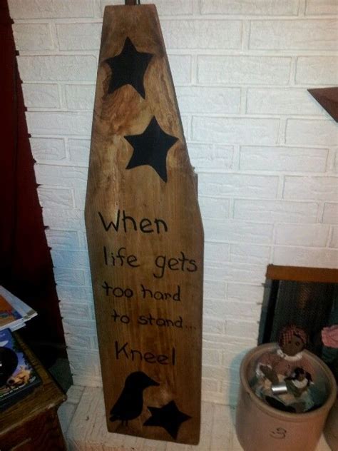 antique ironing board....i painted one of my favorite sayings on ...