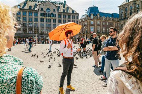 Amsterdam: Historical Highlights Walking Tour with Tasting | GetYourGuide