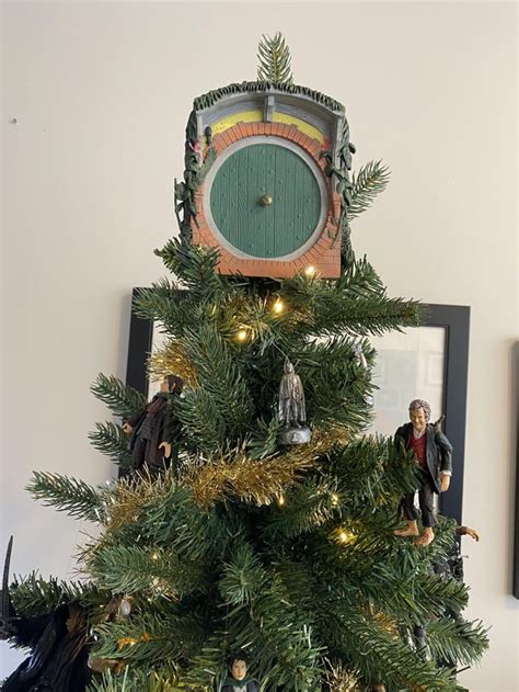 My friend has a Lord of the Rings themed Christmas tree! What do you guys think? : r/lotr