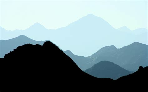 Silhouette of Mountains during Daytime · Free Stock Photo