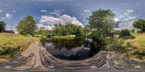 360° view of full seamless spherical hdri panorama 360 degrees angle view on wooden pier of lake ...