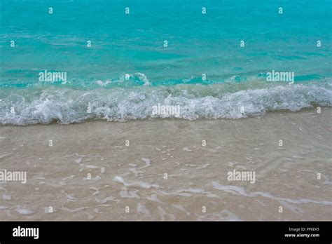 Waves on a beach in the Maldives Islands Stock Photo - Alamy