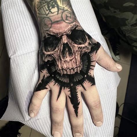 Discover more than 81 skull hand tattoo drawing latest - in.coedo.com.vn