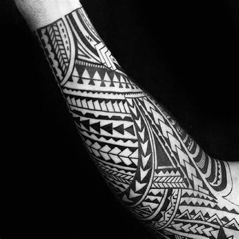 a man's arm with an intricate tattoo design on the left side of his arm