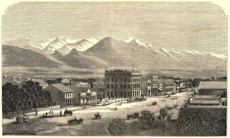 an old drawing of a town with mountains in the background