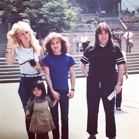 Angus and his wife Ellen in Japan. The little girl isn't their child ...