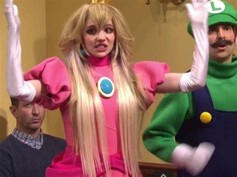 Grimes joins Elon Musk in SNL sketch as the Princess Peach to his Wario ...