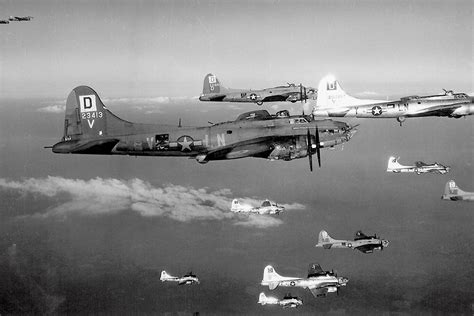 A mixed squadron of 100th Group Flying Fortresses includes a veteran B ...